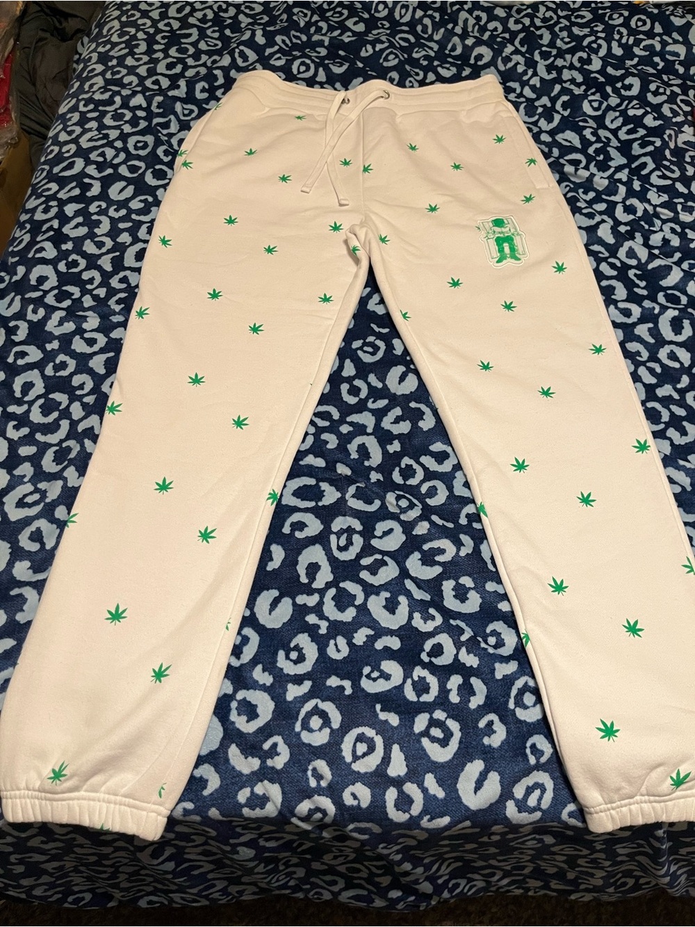 Cream Jogger Sweatpants with Green Leaf Print
